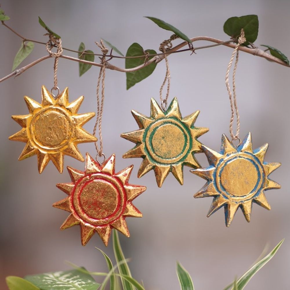 Four Gold Tone Albesia Wood Sun Ornaments from Bali 'Sunny Holiday'