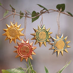 Four Gold Tone Albesia Wood Sun Ornaments from Bali 'Sunny Holiday'