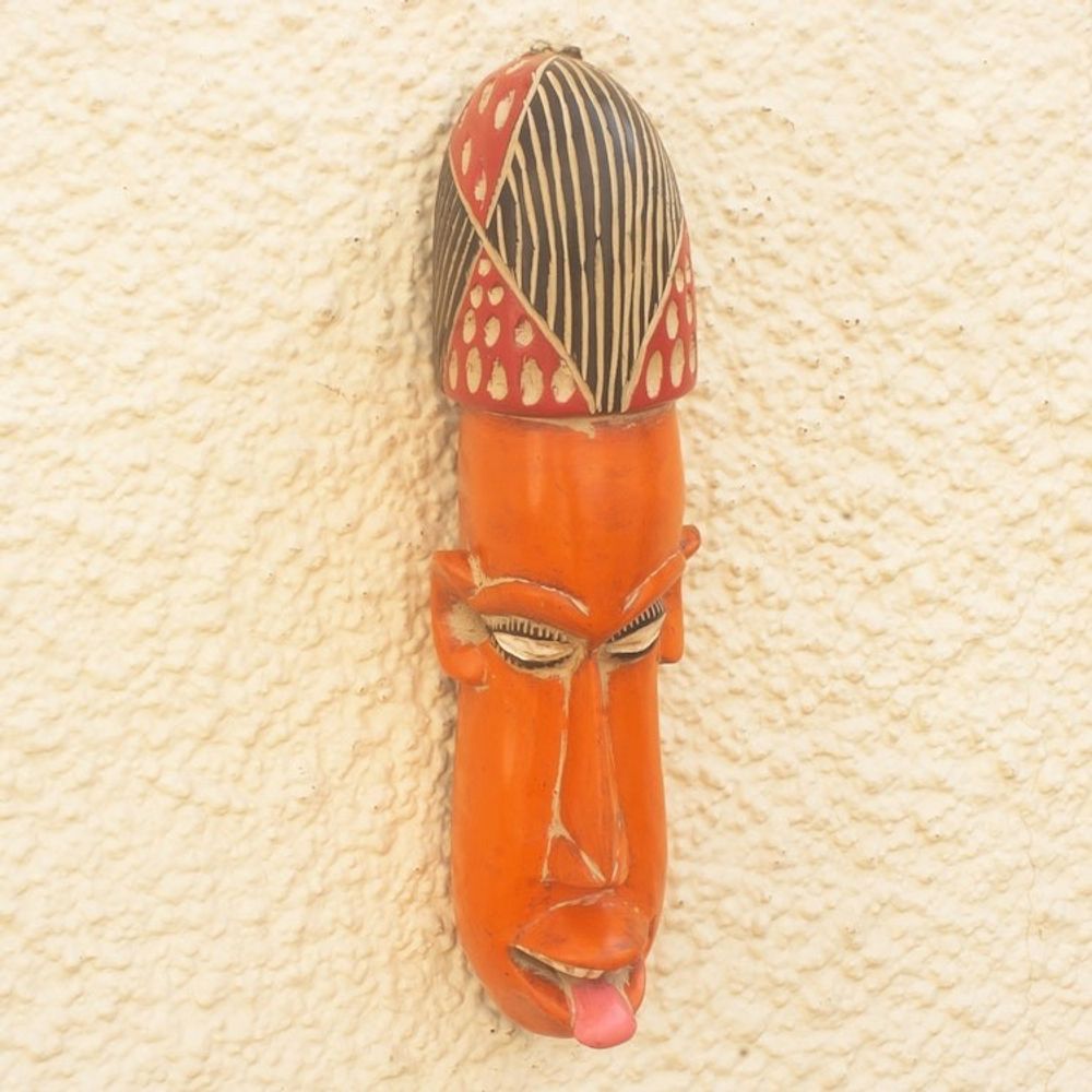Artisan Crafted Orange Sese Wood Mask 'Segbefia'